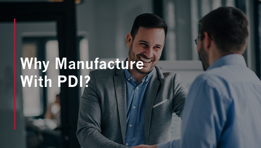 Two business casual men talking with overlay text Why Manufacture with PDI?